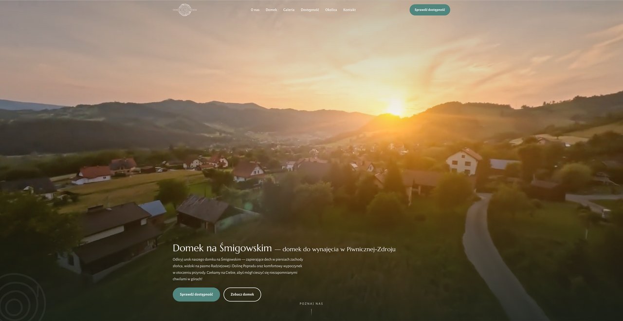 Hero strony domek-piwniczna.pl — kadr z filmu z drona: zachód słońca nad Piwniczną-Zdrojem, nagłówek strony i przyciski rezerwacji